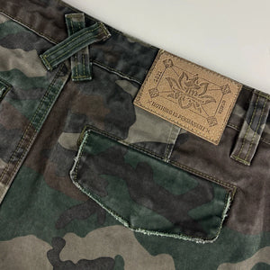 Camouflage pants with leather patch on a white background - Anatta Streetwear