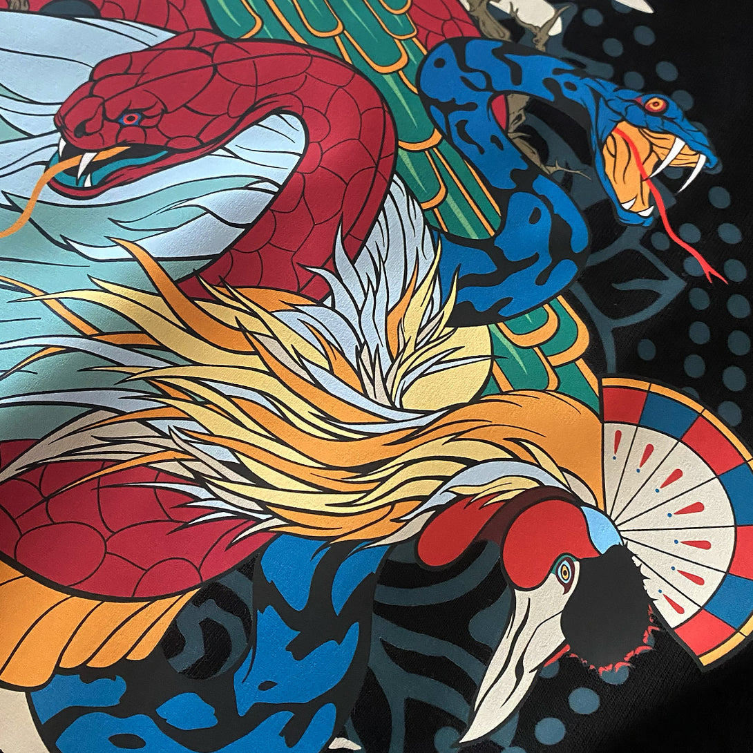 Tender Snake - a close-up of a graphic design inspired by ancient Chinese depictions of snakes, printed on the front of a Japanese style black heavyweight T-shirt -2