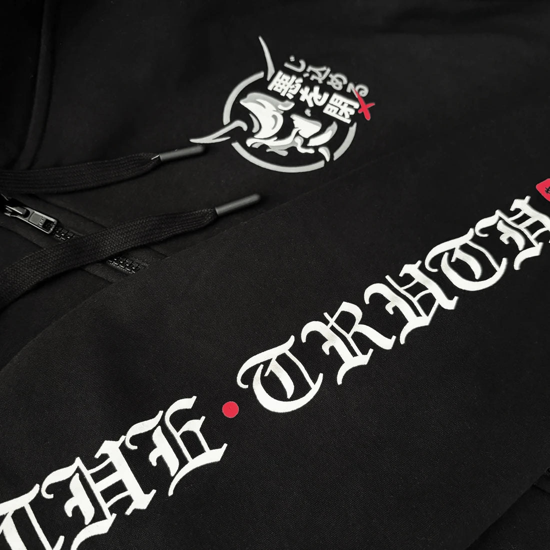 Close-up of graphic prints on sleeve and chest – Anatta hoodie