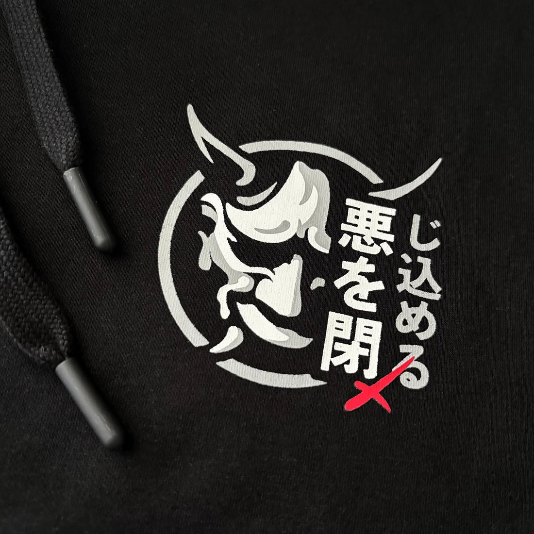 Close-up of graphic prints on chest – Anatta hoodie
