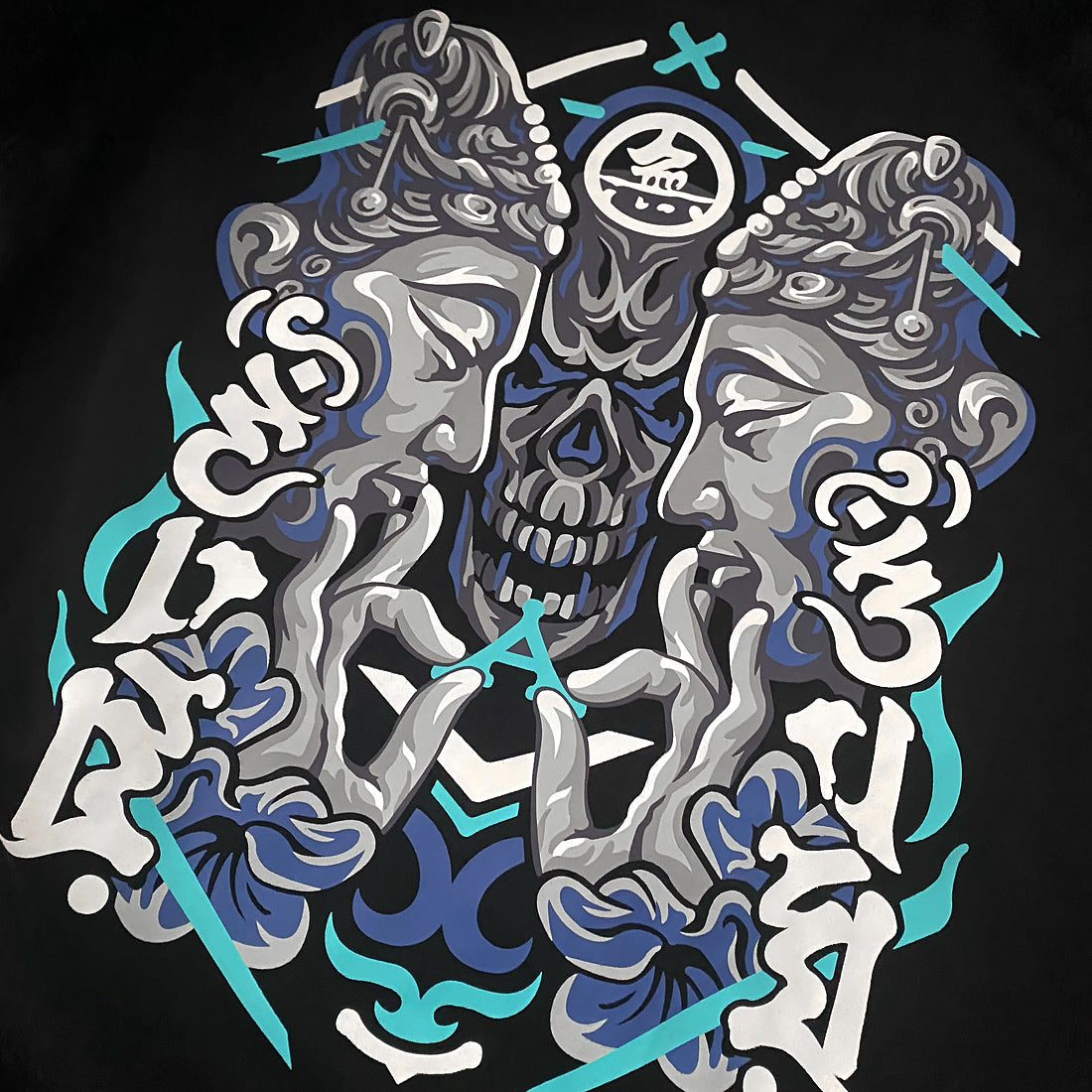 Umarekawari - a close-up of a design of Buddhas confronting the evil illustration printed on the back of a Japanese style black hoodie - Anatta Streetwear