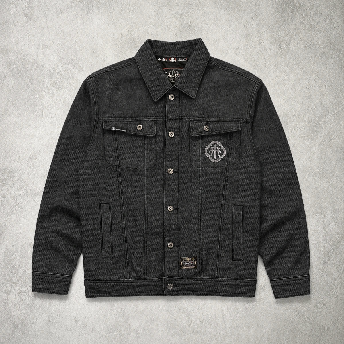 Front view of the Fenikkusu dark grey Japanese denim jacket with embroidered chest detail