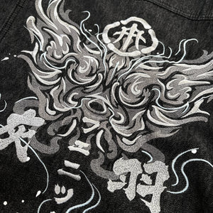 Close-up of phoenix embroidery on the Fenikkusu dark grey Japanese denim jacket