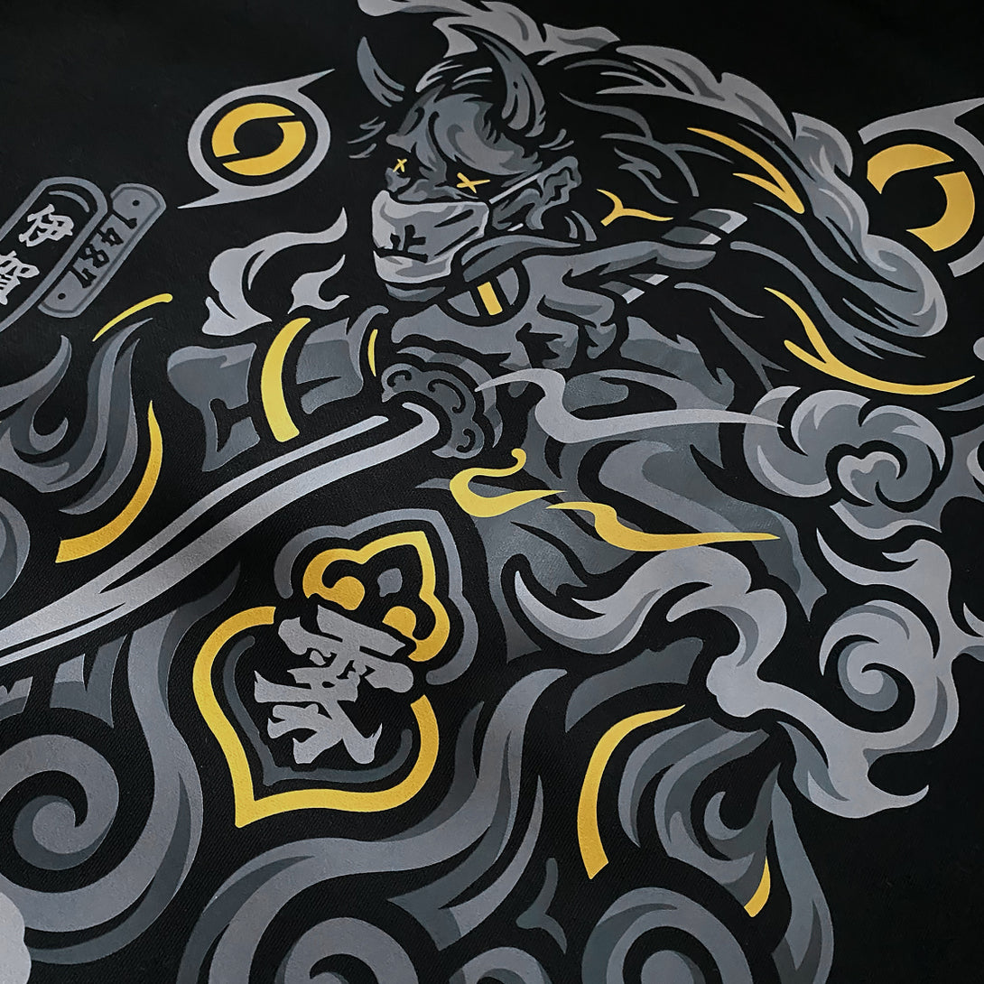 The close-up of a graphic design inspired by Intonjutsu (art of vanishing), printed on the back of a Japanese style sweatshirt - Anatta Streetwear