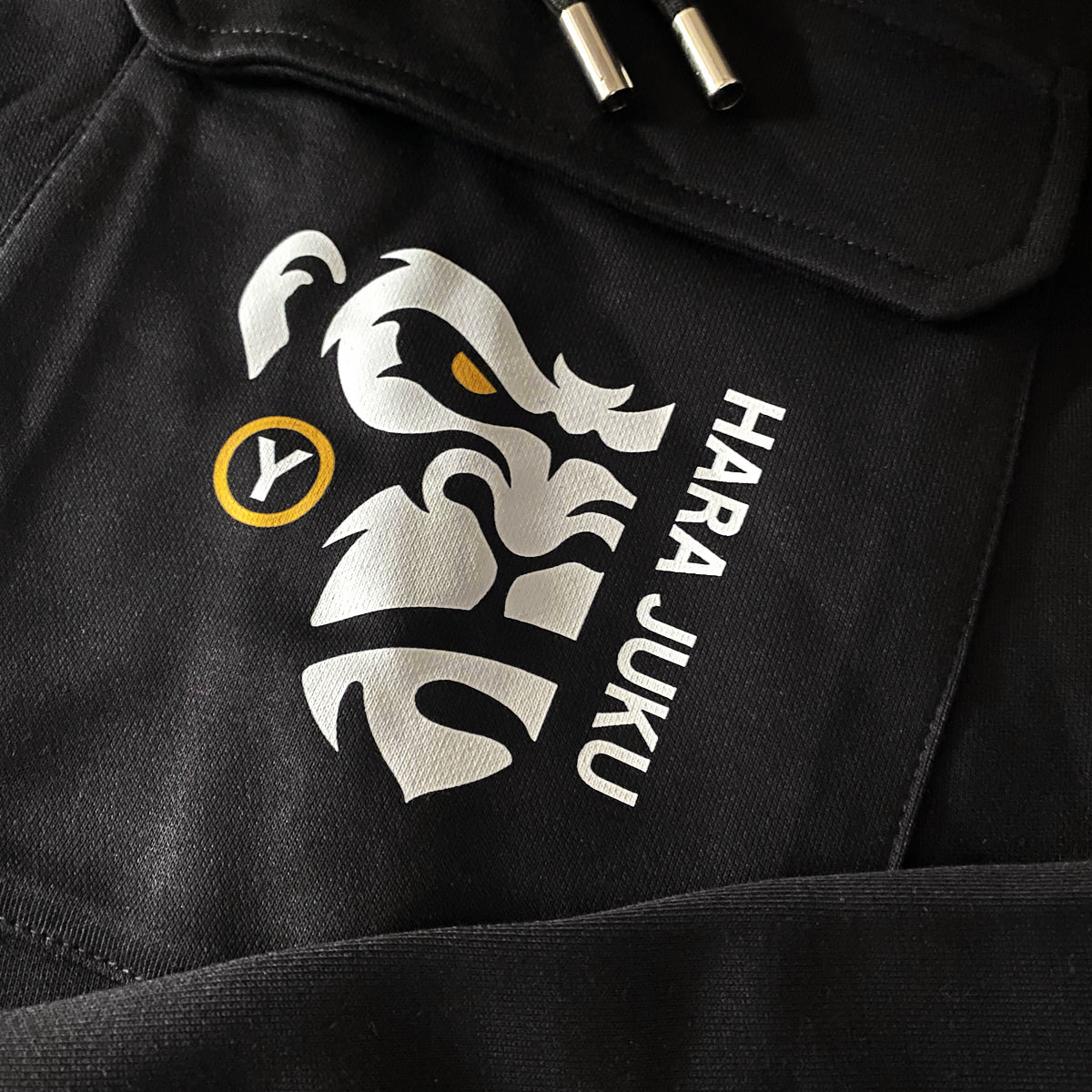 Angry APE - a close-up of the original design printed on the Japanese style black flap pocket pants-1