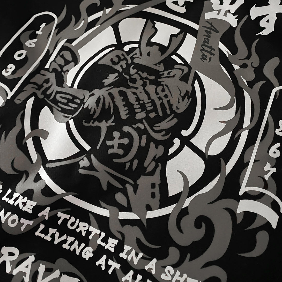 Bravery - a close-up of a design of a Japanese samurai, printed on the front of a Japanese style black sweatshirt-1, anatta streetwear