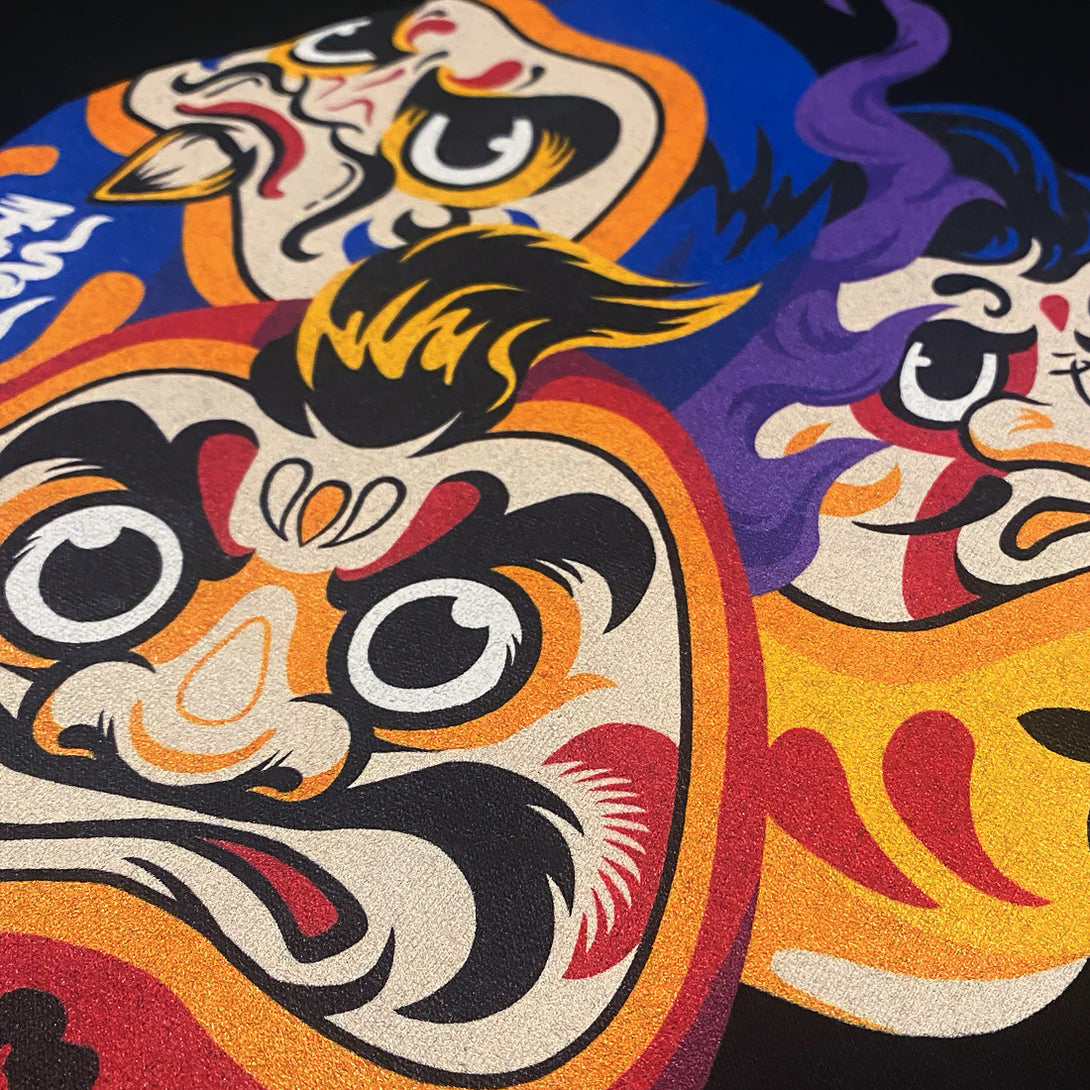 Daruma - a close-up of a graphic design of Japanese drama doll, printed on the front of a Japanese style black heavyweight sweatshirt-3