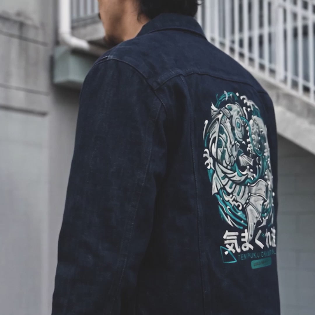 Model wearing the Rogue Wave denim jacket, showcasing the oversized Japanese wave embroidery on the back.