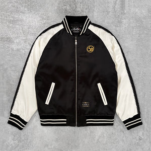 Raijin’s Wrath Japanese satin jacket, front view with black and white color-blocked design and embroidered chest logo