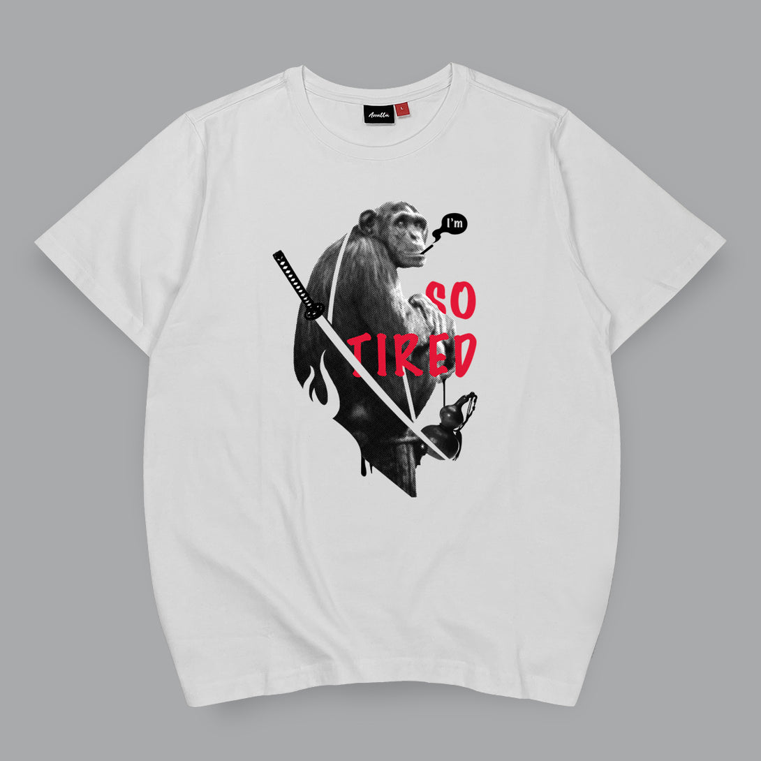 So Tired - a Japanese style white heavyweight T-shirt featuring a graphic design of a tired monkey smoking, printed on the front