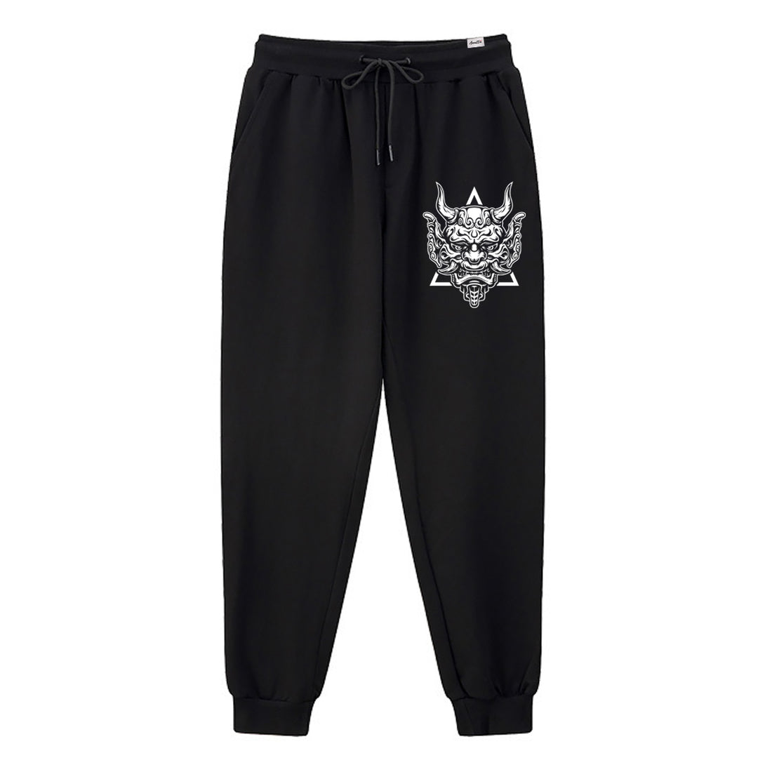 Sins Exist In Human Minds - A Japanese style black sweatpants featuring a design inspired by Japanese Oni masks, printed on the left.