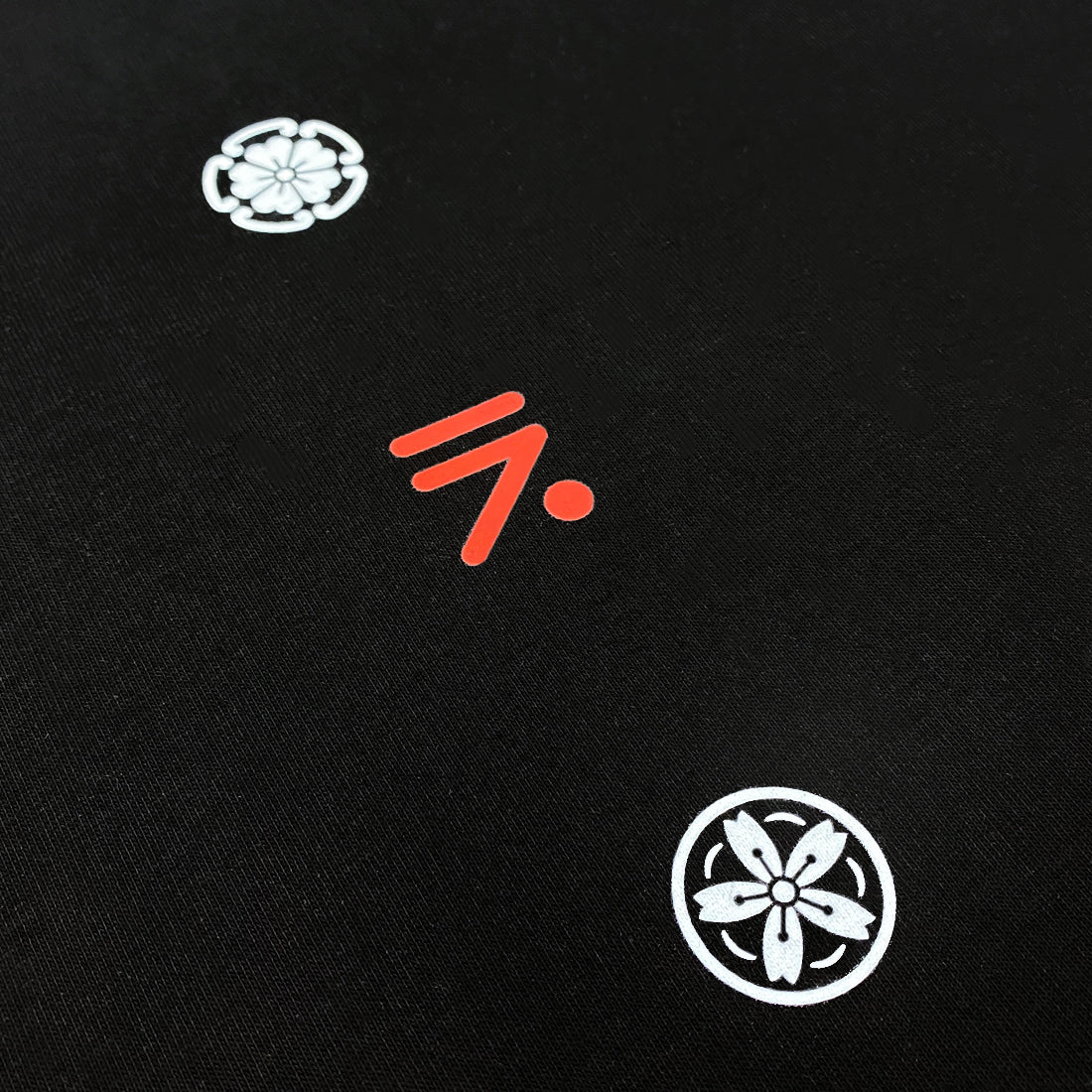 Kamon - a close-up of Japanese kamon design, printed on the front of a Japanese style black heavyweight T-shirt-2