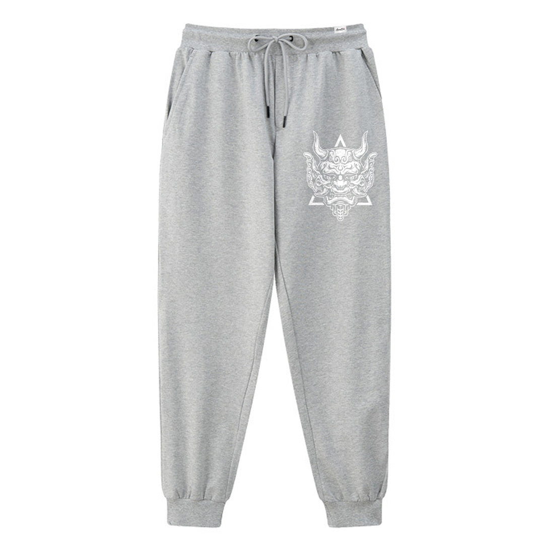 Sins Exist In Human Minds - A Japanese style light grey sweatpants featuring a design inspired by Japanese Oni masks, printed on the left.