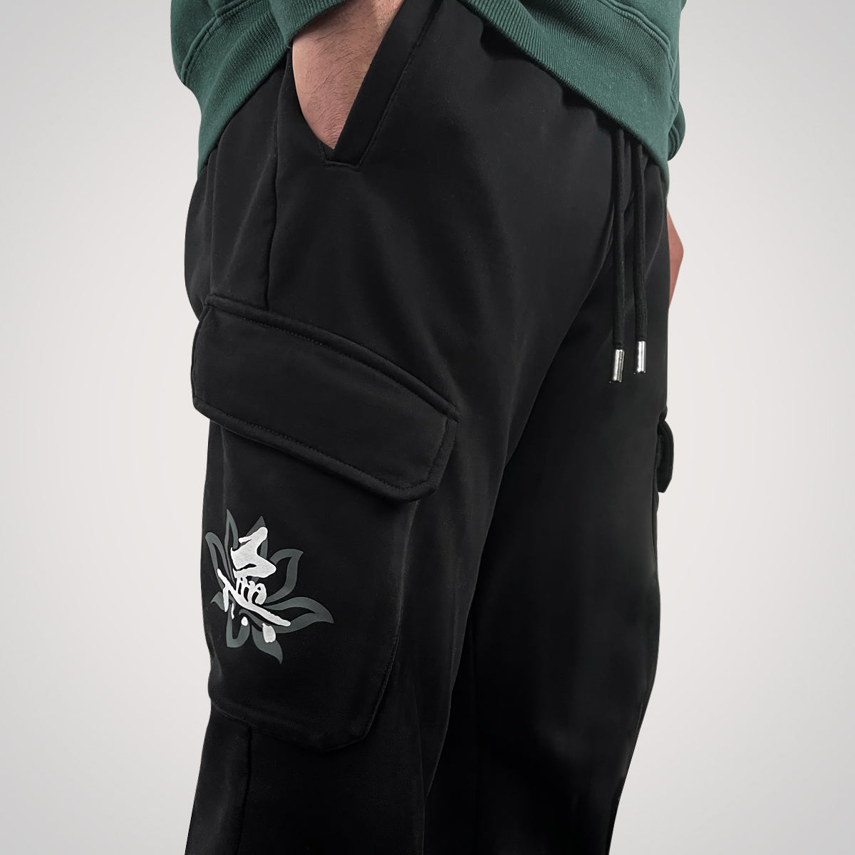 Emptiness - a Japanese style black flap pocket pants with original design printed on the two pockets- right side view