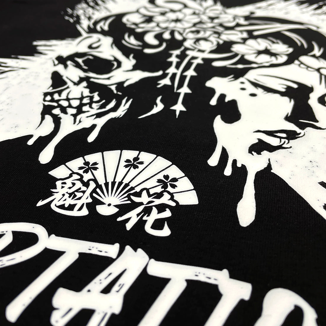 Oiran x Temptation - a close-up of the design that combines oiran with a skull printed on the back of a Japanese style black hoodie-1