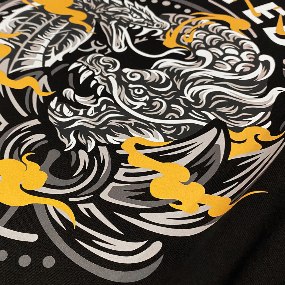 Addiction - a close-up of the design of a dragon and a snake in combat, printed on a Japanese style black heavyweight T-shirt-2