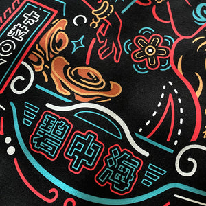 Neon - a close-up of the design inspired by vintage Shanghai neon lights printed on the back of a Japanese style black hoodie-3