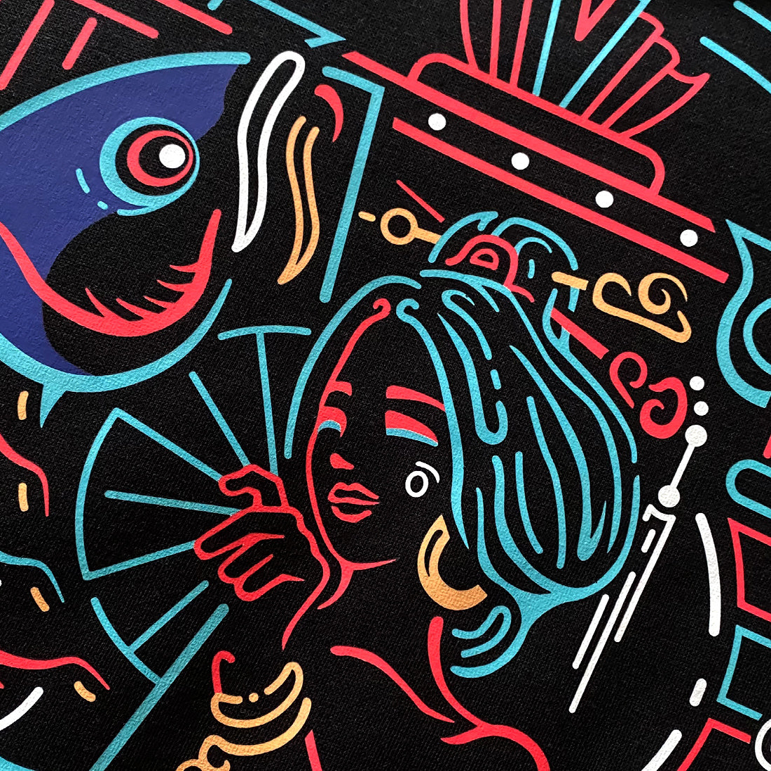 Neon - a close-up of the design inspired by vintage Shanghai neon lights printed on the back of a Japanese style black hoodie-2