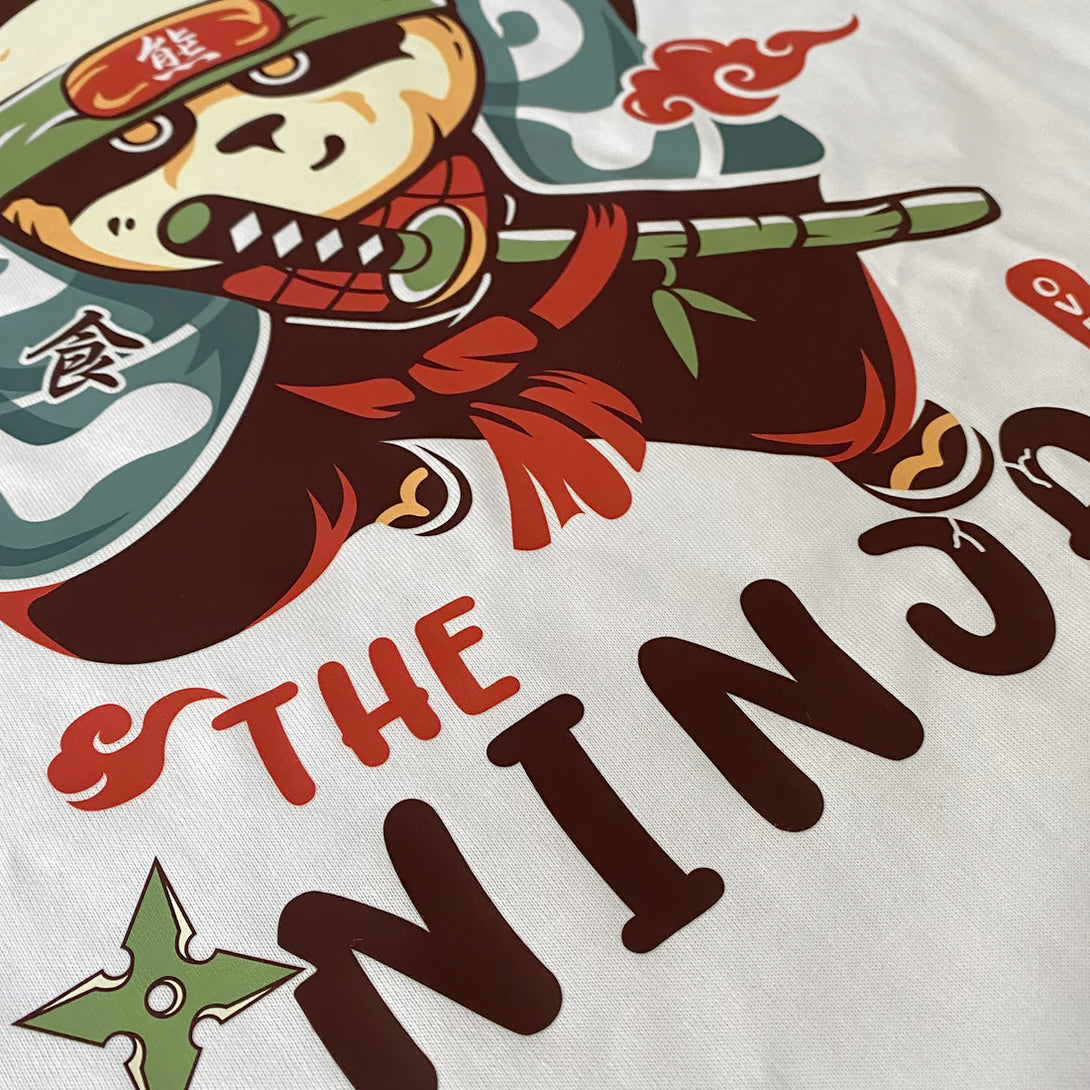 Oversized Ninja - a close-up of an amusing graphic design of an oversized Japanese panda ninja, printed on the Japanese style white heavyweight T-shirt-2