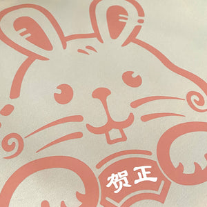 The Year of Rabbit- a close-up of a cute rabbit design printed on the front of a khaki sweatshirt-1