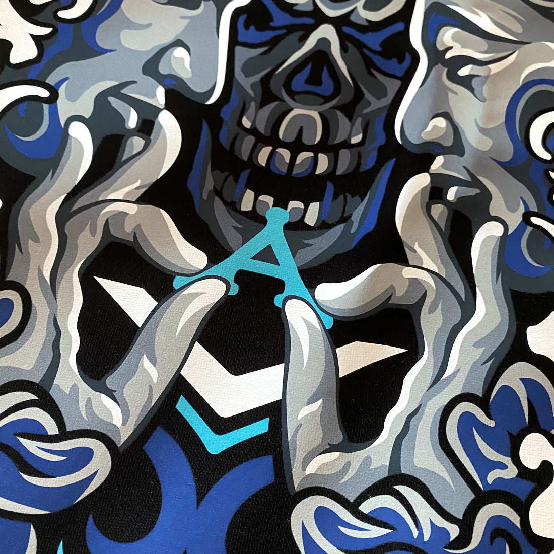 Umarekawari- a close-up of a design of Buddhas confronting the evil illustration printed on the front of a black sweatshirt -2