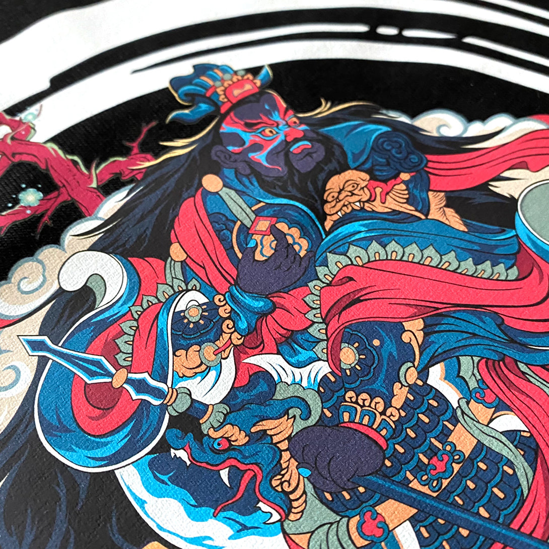 Taming The Tiger - a close-up of the intricate graphic design of an Eastern deity taming a fierce tiger, printed on a Japanese style black heavyweight T-shirt-1