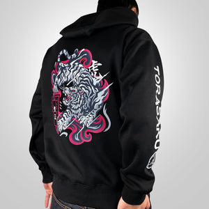 The tiger- a model wearing a black hoodie with the intricate illustration of a fierce Japanese tiger printed on the back-back view-2